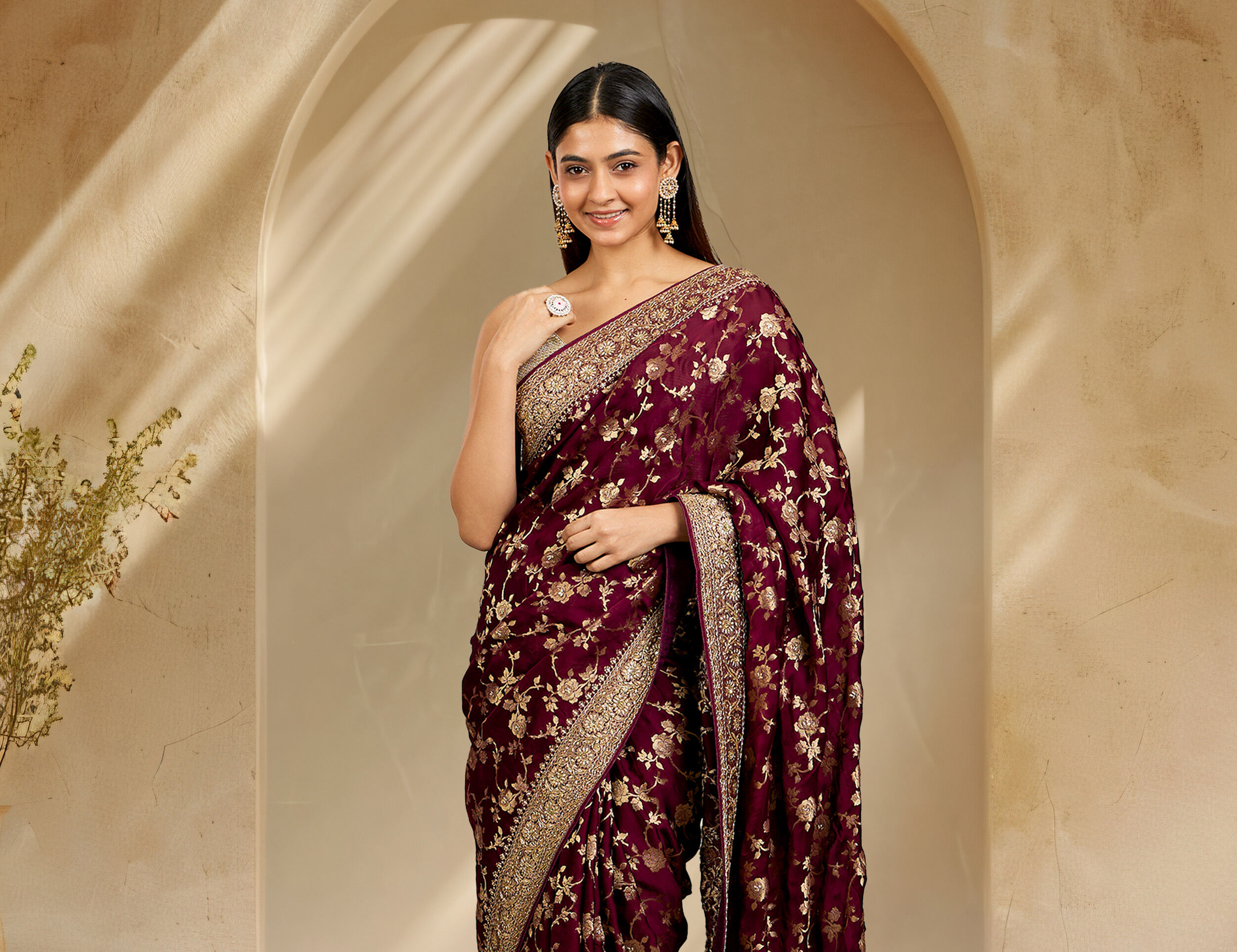 Women wearing beautifull red designer saree